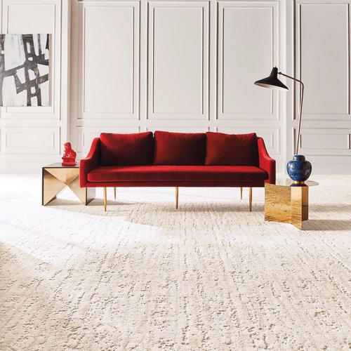 White nylon carpet with a red couch - learn more about nylon